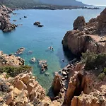 Nyaraló Rocce Rosse *
